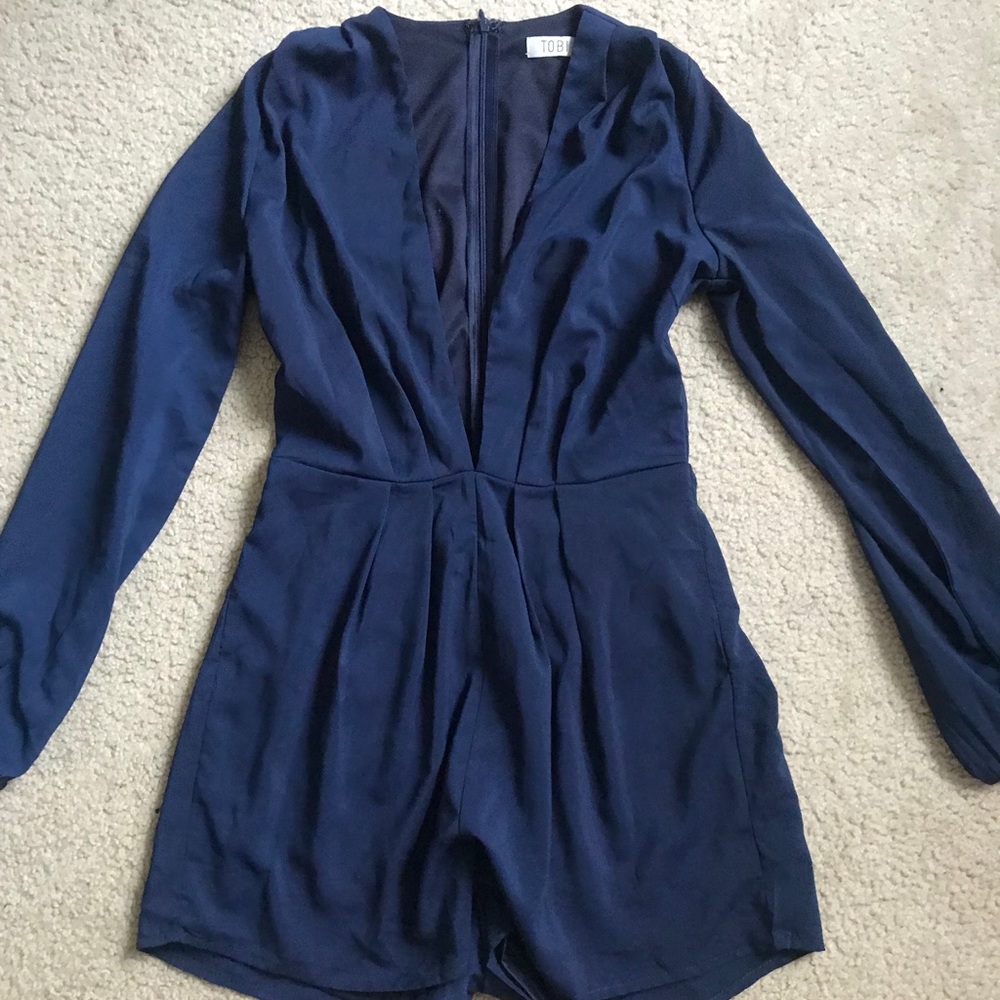 Never worn deep V navy romper